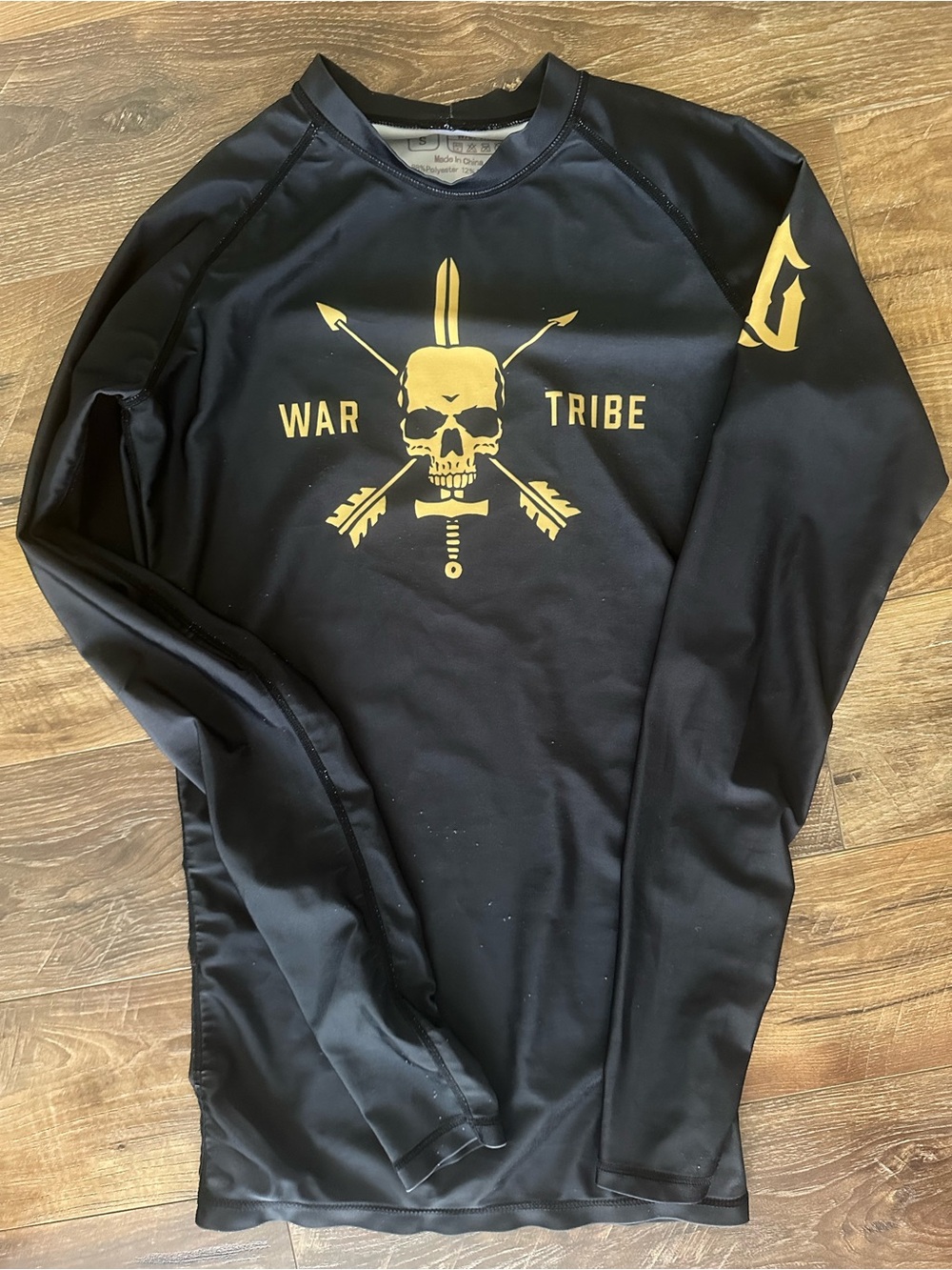 Men's Black Rash Guard with Gold 'War Tribe' Skull Graphic